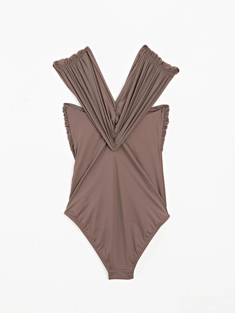 Bandeau swimsuit with criss-cross straps