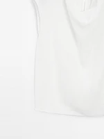 Blouse fluide à col drapé