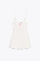 CUT OUT HANDKERCHIEF SHORT JUMPSUIT