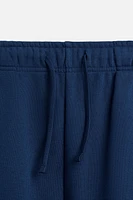 BERMUDA DE JOGGING COUTURES