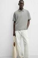 TEXTURED ZIP POLO SHIRT