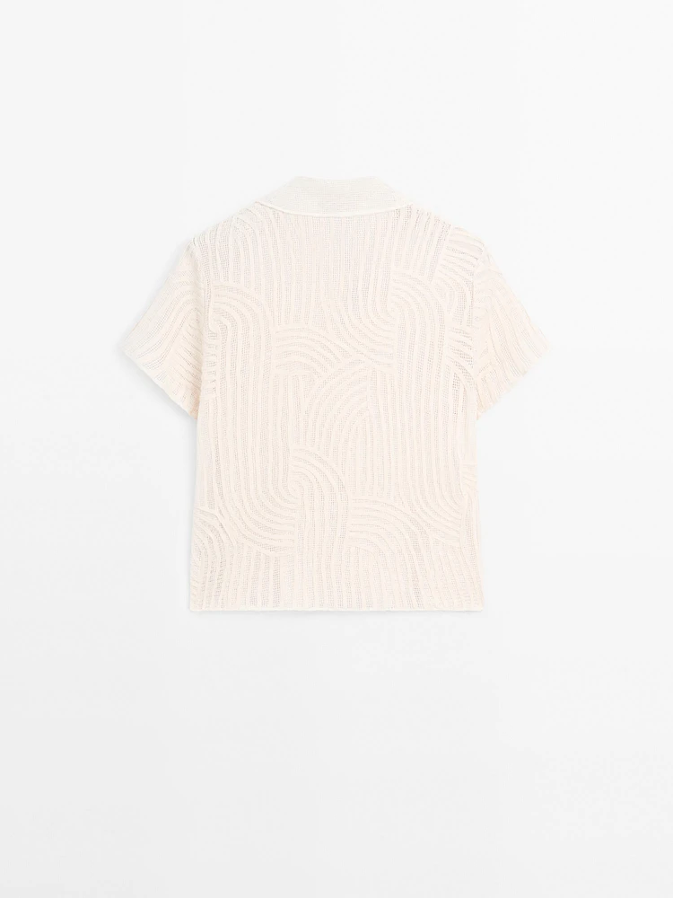 Polo en maille ajourée avec broderie