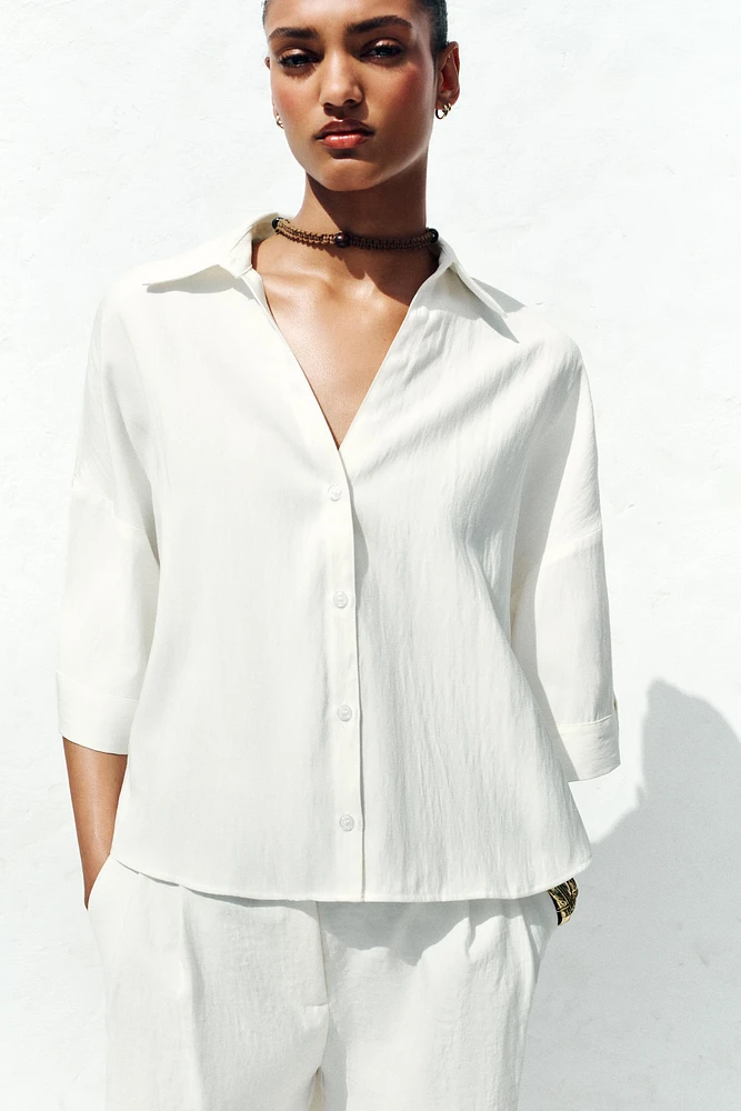 CHEMISE MANCHES COURTES LARGES