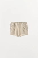 PLEATED LACE SHORTS