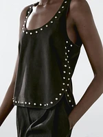 Top en cuir et daim à clous