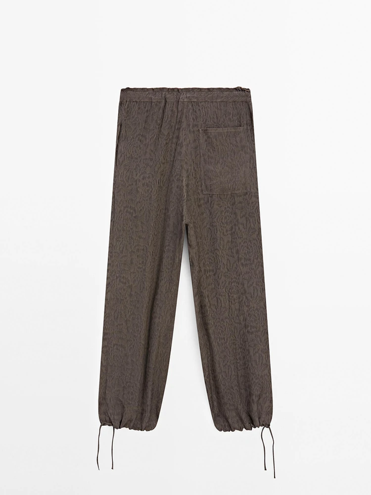 Flowing wide-leg jacquard trousers