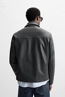 BLOUSON EN CUIR SYNTHÉTIQUE À POCHES