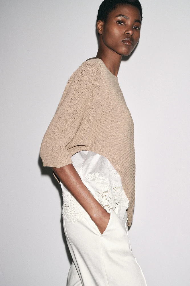 ASYMMETRICAL COMBINATION KNIT TOP