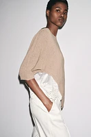 ASYMMETRICAL COMBINATION KNIT TOP