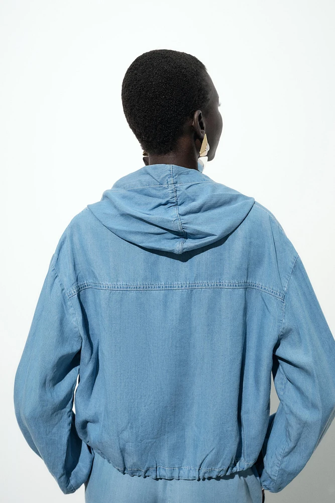 ADJUSTABLE HEM HOODED JACKET