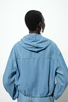 ADJUSTABLE HEM HOODED JACKET