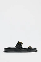 BUCKLED SANDALS
