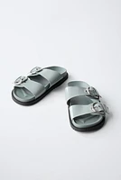 PATENT LEATHER BUCKLE SANDALS