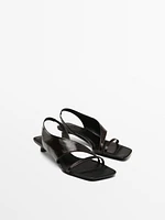 Asymmetric heeled sandals