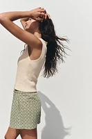 EMBROIDERED PERFORATED SHORTS