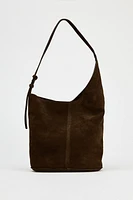 ASYMMETRIC SOFT SUEDE BUCKET BAG