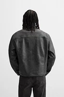 BLOUSON EN MATIÈRE SYNTHÉTIQUE DÉLAVÉE