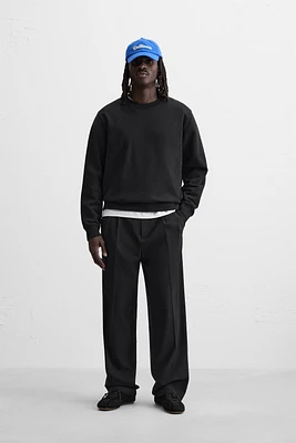 PLEATED WIDE FIT PANTS