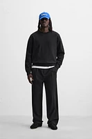 PLEATED WIDE FIT PANTS