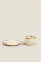 PORCELAIN TEACUP WITH ANTIQUE FINISH RIM