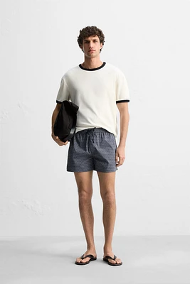 GEOMETRIC PRINT SHORT SWIMMING TRUNKS