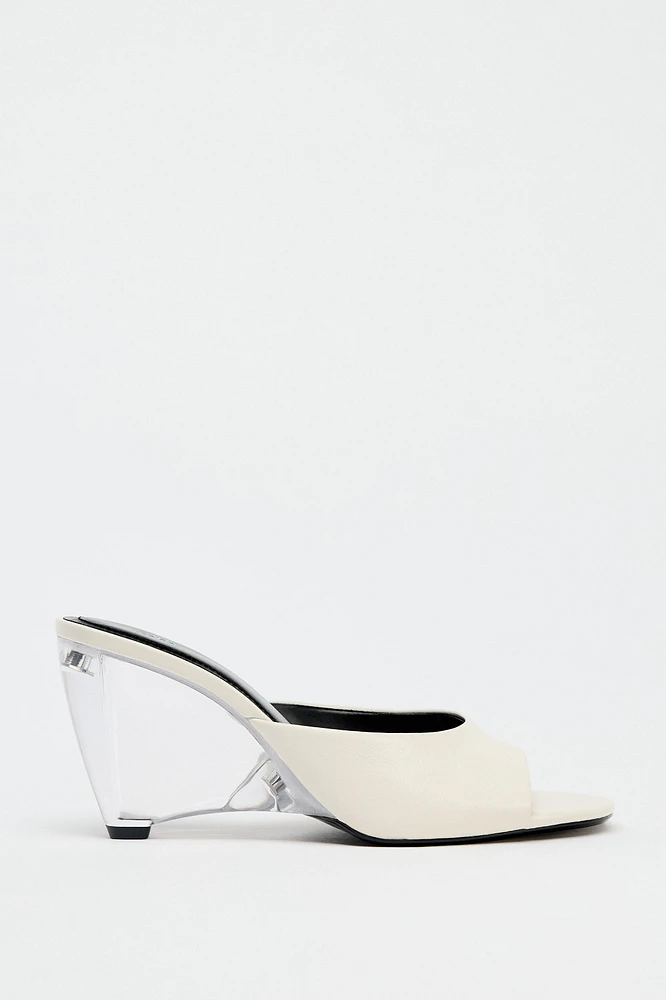 TRANSPARENT WEDGE LEATHER MULES