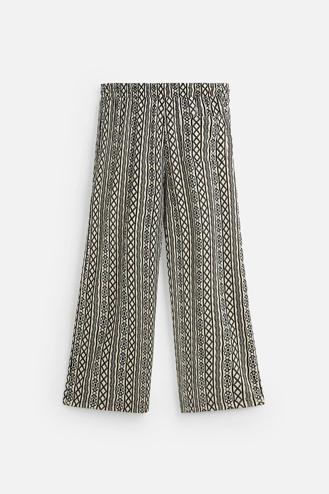 PERFORATED JACQUARD RELAXED FIT PANTS