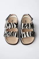 SANDALES EN CUIR ANIMAL PRINT