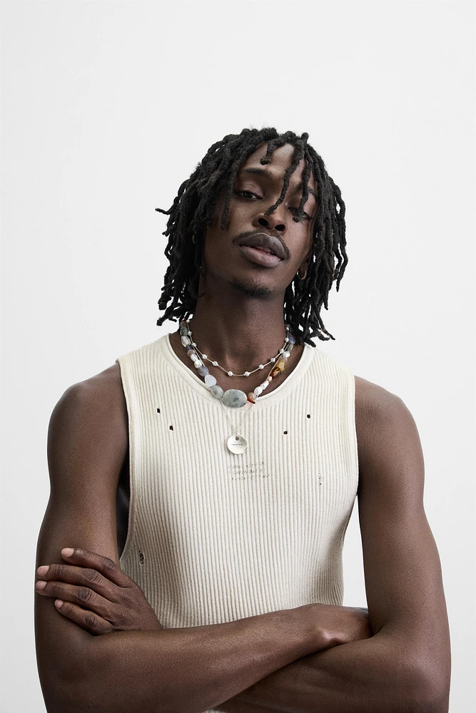 T-SHIRT EN MAILLE IMPRIMÉ SPRAY