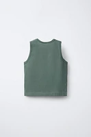 T-SHIRT SANS MANCHES BOUTONS