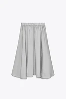 JUPE MIDI FLUIDE VOLUME