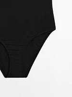 Maillot de bain à bretelles roulottées