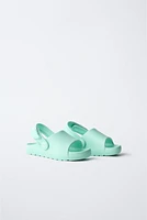RUBBERIZED SLIDES