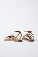 STRAPPY LEATHER SANDALS