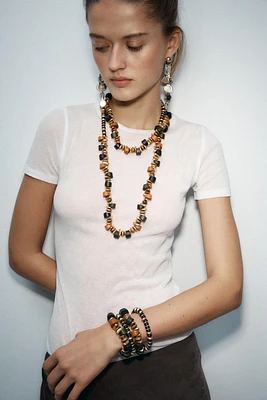 TWO-PACK OF WOODEN PIECE NECKLACES