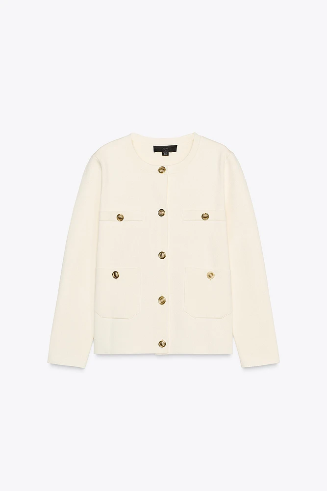 GILET EN MAILLE UNI