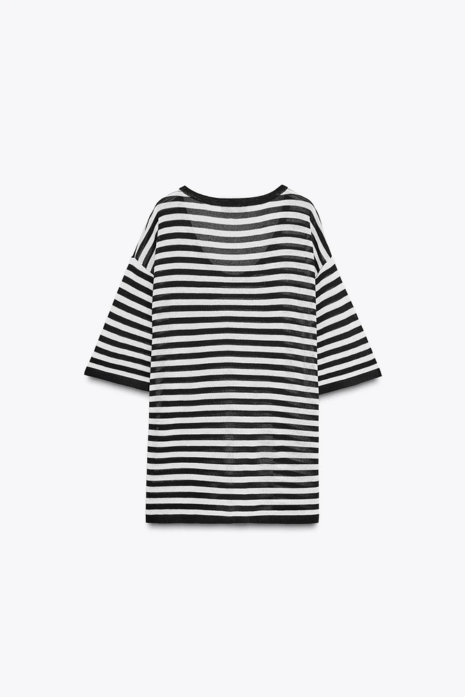 TOP OVERSIZE EN MAILLE MANCHES COURTES