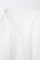 TEXTURED TIED BLOUSE