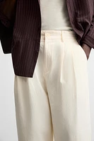 PLEATED CHINO PANTS