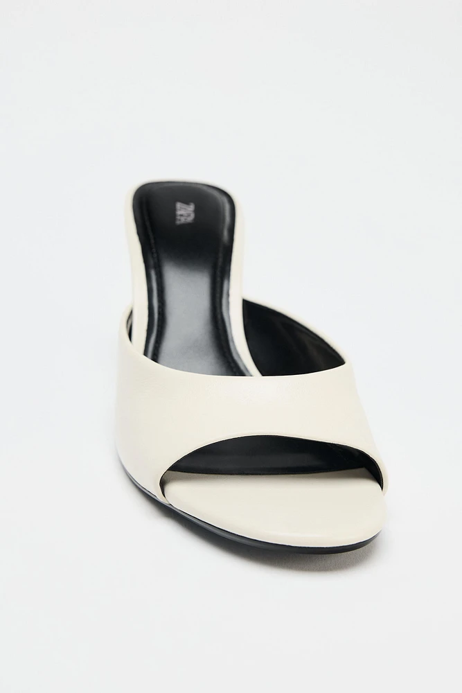TRANSPARENT WEDGE LEATHER MULES