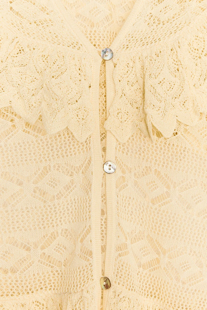 BLOUSE EN MAILLE POINTELLE À VOLANTS