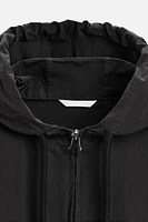 HOODED TECHNICAL JACKET