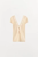 TOP EN MAILLE DENTELLE FLEUR