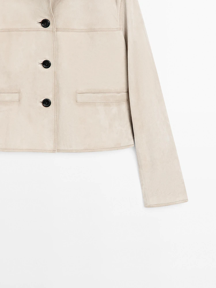 Veste courte à surpiqûres en cuir finition daim
