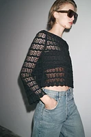 PULL COURT EN MAILLE POINTELLE