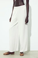 PANTALON EN CRÊPE À JAMBES LARGES