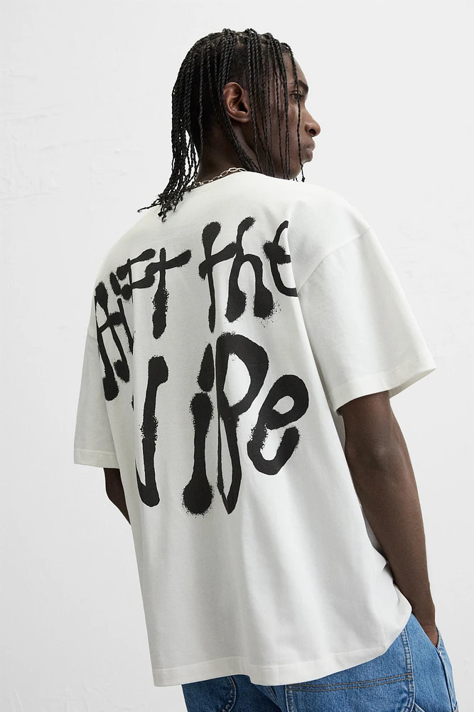 T-SHIRT À INSCRIPTION GRAFFITI