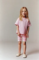PLAIN T-SHIRT AND PRINTED BIKE SHORTS SET