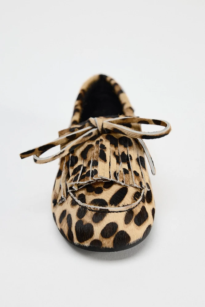 ANIMAL PRINT FUR LINED LEATHER LOAFERS