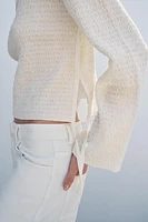 HAUT À TEXTURE AVEC NŒUDS